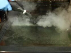 Steam Cleaning Kitchen Oven Door Stock Footage