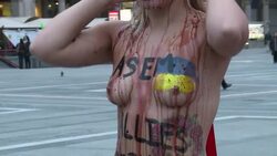 CLEAN : Femen activists cover themselves in Ukrainian blood News Clip