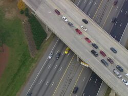 MS AERIAL Shot of Moving car on bridge and road / North Carolina, United States Stock Footage