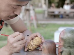 CU Artist making Matryoshka doll at the park / Nerima, Tokyo, Japan Stock Footage