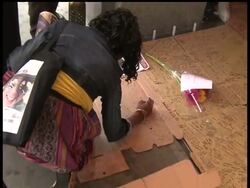 People heading to and from work in New York on Friday are stopping at a makeshift memorial outside Harlem's Apollo Theater, where pop icon Michael Jackson performed as a child. Jackson died on Thursday News Clip