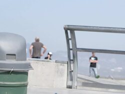 MS SLO MO Shot of guy jumping over rail / Venice, California, United States Stock Footage
