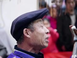 CU TD Folk artists of chinese shadow play troupe playing accompaniment with traditional music instrument during chinese spring festival  AUDIO  / xi'an, shaanxi, china Stock Footage