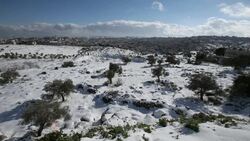 Beit Jala Arab city covered with snow, view south towards west bank  from Gilo, Jerusalem Stock Footage