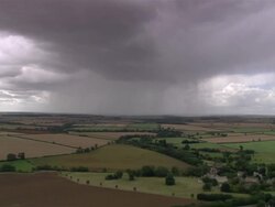 Aerial storm clouds over English countryside / Lincolnshire, England Stock Footage