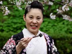 Japanese Kimono Woman Eating Sushi Stock Footage