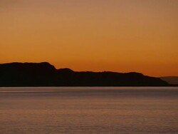 WS PAN Silhouetted hills and calm water / Greece Stock Footage
