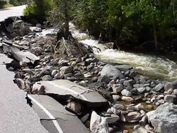 HD video creek flood wash out road Boulder Colorado Stock Footage