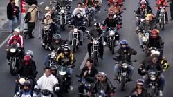 CLEAN : Guatemala: motorcycle pilgrims roar cross- News Clip