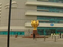 Pan right Golden Bauhinia square Hong Kong China Stock Footage