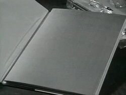 CU Man opening book AUDIO / Russia Stock Footage