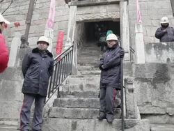 MS TU People standing front door and stairway to god of Medicines Temple at temple fair during chinese spring festival / tongchuan, shaanxi, china Stock Footage