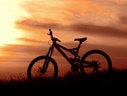 HD Super Slow-Mo: Silhouette Of A Mountain Bike Stock Footage