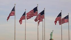 Statue of Liberty and US Flags, New York City, USA Stock Footage