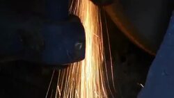 Close-up of worker cutting metal with grinder. Stock Footage
