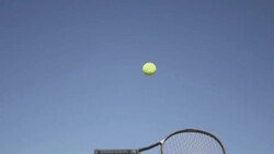 Slow Motion of Tossing Tennis Ball and Racket Stock Footage