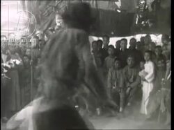 The Great Wall of China, tourists, children, street fighters, donkey trains and camels. Beijing, China, 1920s Stock Footage