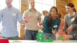 Business people stacking green blocks Stock Footage