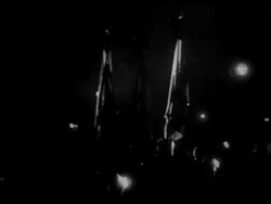 B/W 1933 parade of Nazis carrying flags + torches at night / Hitler just appointed chancellor Stock Footage