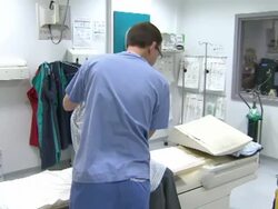 Patient Inside CT Scanner And Assisted From Room News Clip