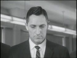 FBI agents examine fingerprint cards in the busy Identification Division of the Federal Bureau of Investigations offices. News Clip