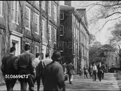 1951: HARVARD UNIVERSITY CAMPUS: HA WS Students walking sidewalks in Harvard Yard & next to dormitories, MS Hollis Hall plaque, HA WS Clock on oldest building Massachusetts Hall (1720), Harvard Yard & statue of John Harvard, University Hall (1815) BG. Instructional Video