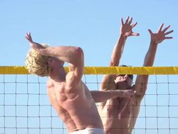 Men playing beach volleyball. - Slow Motion - filmed at 240 fps Stock Footage