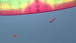 CLEAN : Paragliders fill Bali's skies for new world record News Clip