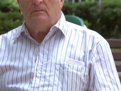 Tilt to Holocaust Survivor Stock Footage