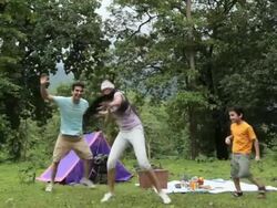 Family playing in a forest, Malshej Ghat, Maharashtra, India Stock Footage