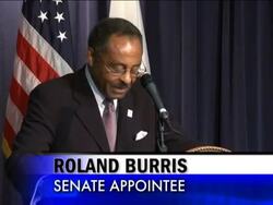 Ill. Gov. Rod Blagojevich's appointment of former state Atty. Gen. Roland Burris to Barack Obama's Senate seat injected race into the drama surrounding the embattled governor, who repeatedly sought to distance his selection from charges that he tried to sell the seat to the highest bidder. News Clip