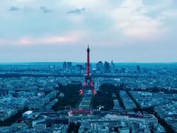 High view on Eiffel Tower and La Defense day to night zoom out Stock Footage