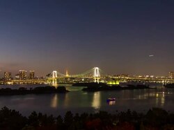 Day to night view of Rainbow bridge at Odaiba Stock Footage