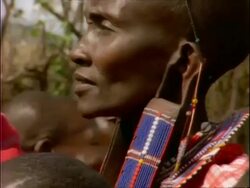 CU Masai tribeswoman performing ritual dance, Kenya Stock Footage