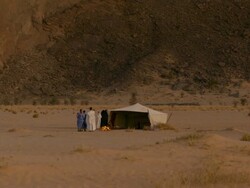 Man talking to people at mauritanian tent Stock Footage