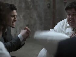 Businessman in therapy, hitting pillow then hugging it Stock Footage