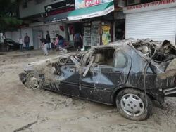 A completely destroyed car after a massive flooding in Varna, Bulgaria Stock Footage