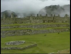 Machu Picchu, pan left across ruins, MS, Peru Stock Footage