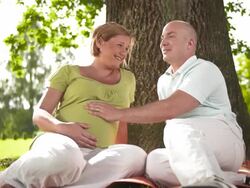 HD DOLLY: Happy Parents To Be In The Park Stock Footage