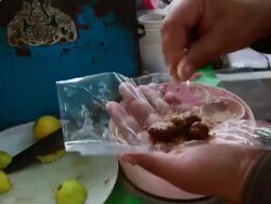 MS TU Man preparing digestive condiments at stall / Amritsar, Punjab, India Stock Footage