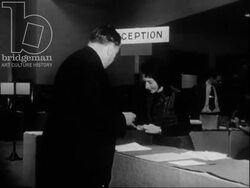 Female airline stewardess, receptionist, and journalist, 1950s Stock Footage