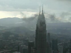 ZI Top of Petronas Twin Towers above the clouds  / Kuala Lumpur, Malaysia Stock Footage