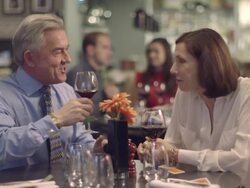 MS R/F People having food in restaurant, waiter serving food Stock Footage