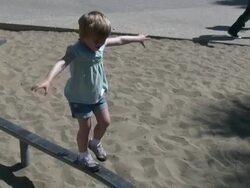 (HD1080i) Child Development: Playing, Balancing, Coordination  (Hand Held) Stock Footage