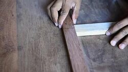 closeup of carpenter shoot nail gun Stock Footage