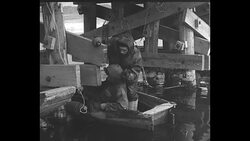 British soldiers wire explosives onto the Han River Bridge during the Korean War News Clip