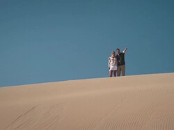 Couple in desert Stock Footage