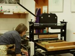 woman in a printing shop Stock Footage