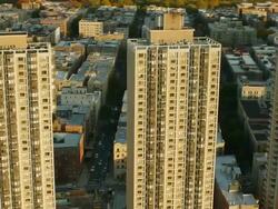 Aerial flying past residential buildings along the Hudson River in Harlem Stock Footage