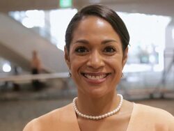  PAN Portrait of smiling businesswoman wearing pearls / Seattle, Washington, United States Stock Footage